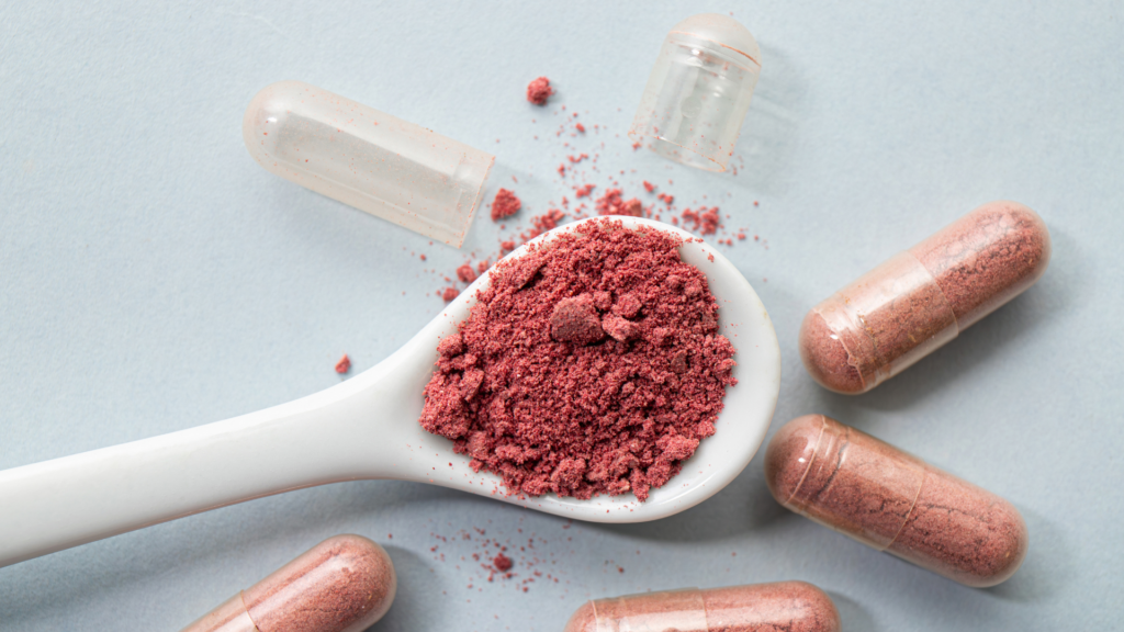 Powder and empty capsule halves showing inconsistent capsule fill weight